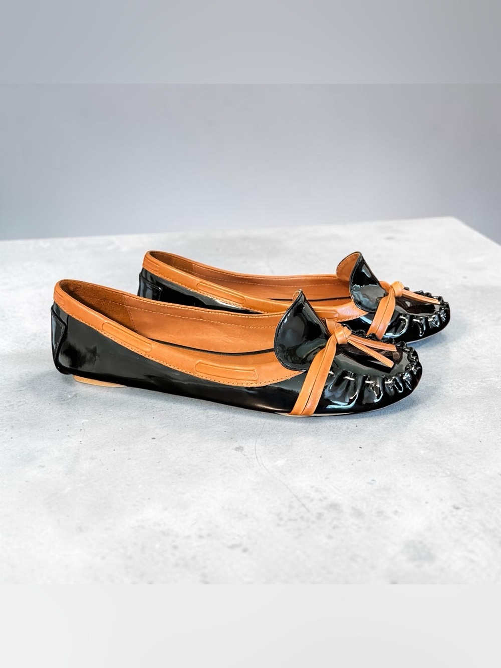 kate spade Black and Tan Patent Bow Moccasin Flats
